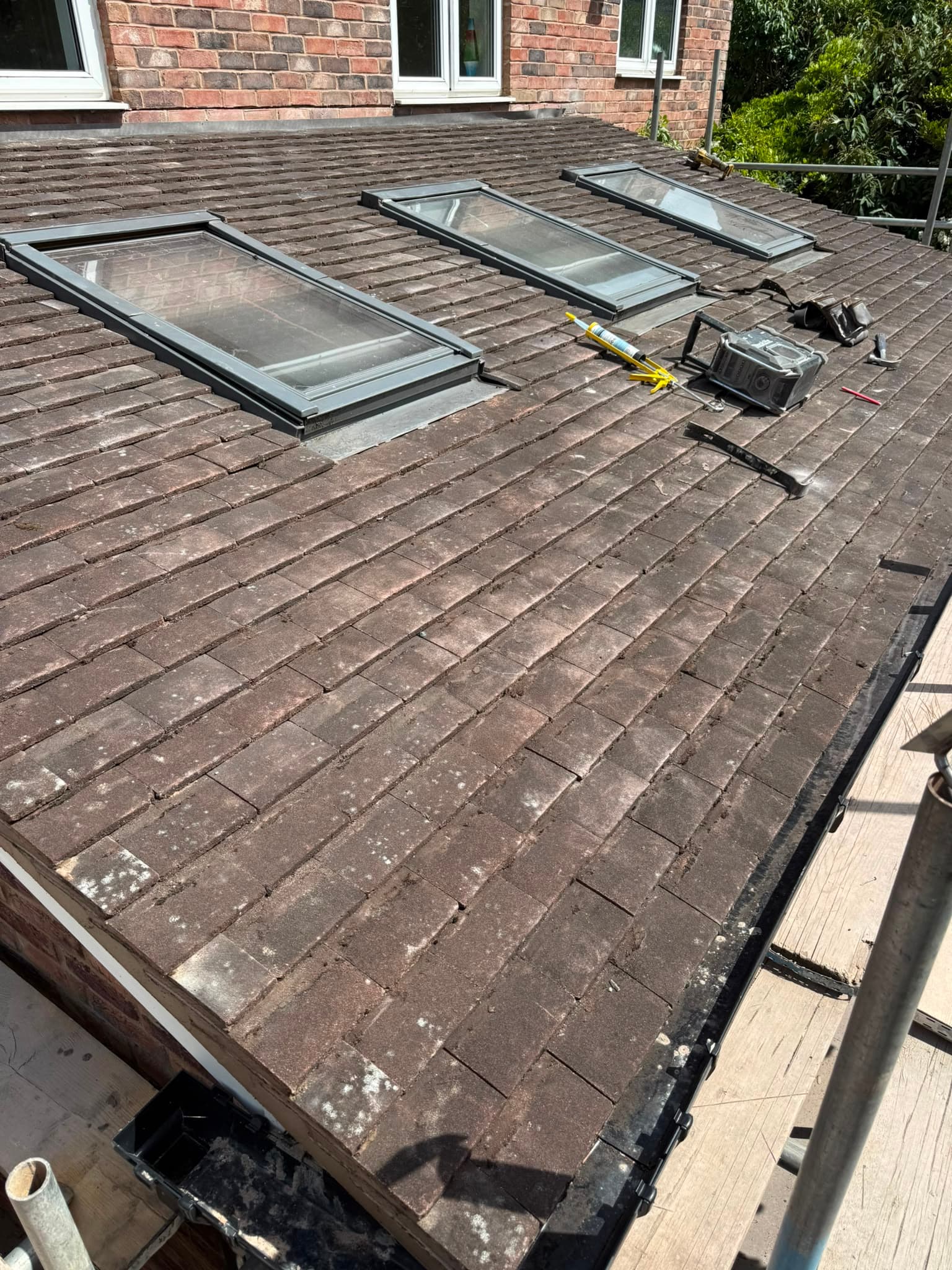 Finished tiled roof on a job in Dickens Heath, with three roof windows fitted and flashed.
